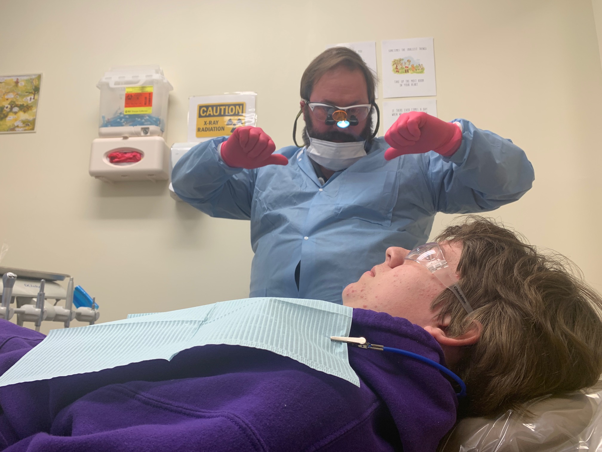 dentist speaking to child patient